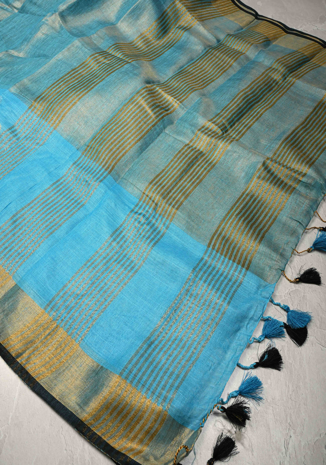 Sky Blue Tissue Body Linen Saree in Muted Antique Gold with Sona Rupa Polka Dots Skirt Border