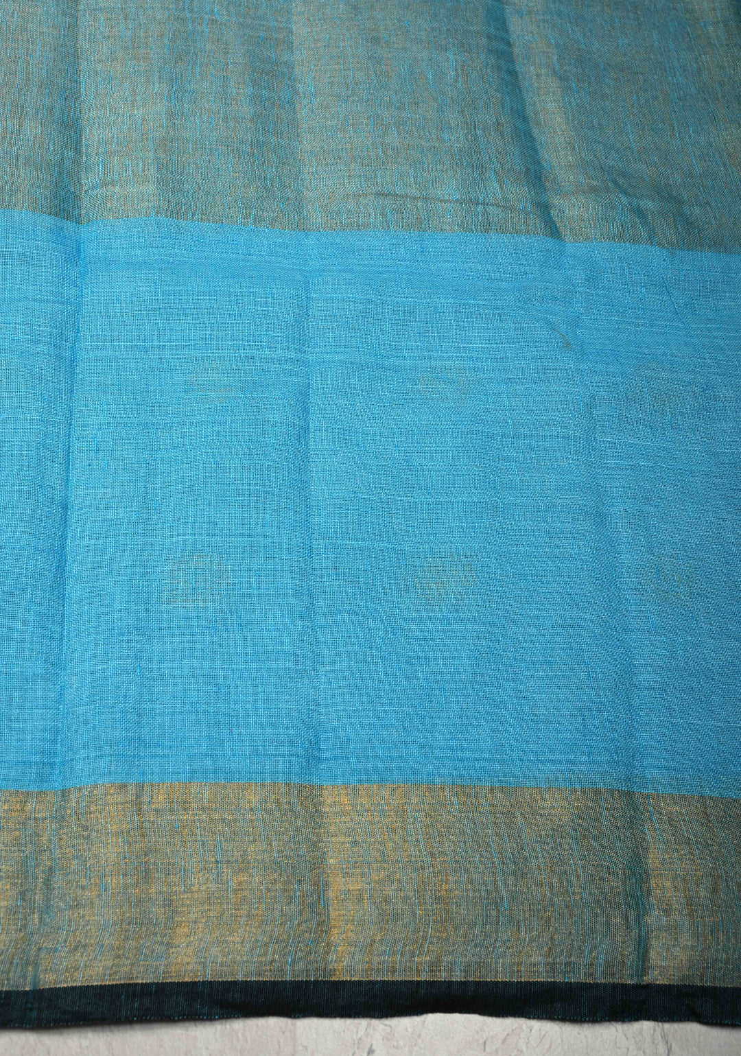 Sky Blue Tissue Body Linen Saree in Muted Antique Gold with Sona Rupa Polka Dots Skirt Border