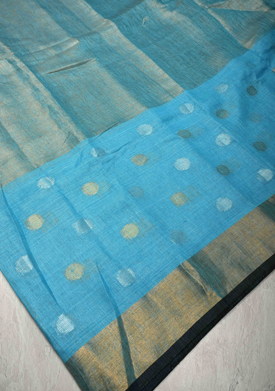 Sky Blue Tissue Body Linen Saree in Muted Antique Gold with Sona Rupa Polka Dots Skirt Border