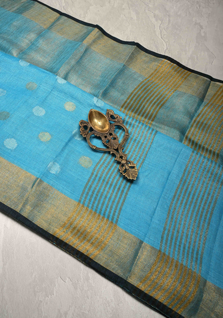 Sky Blue Tissue Body Linen Saree in Muted Antique Gold with Sona Rupa Polka Dots Skirt Border