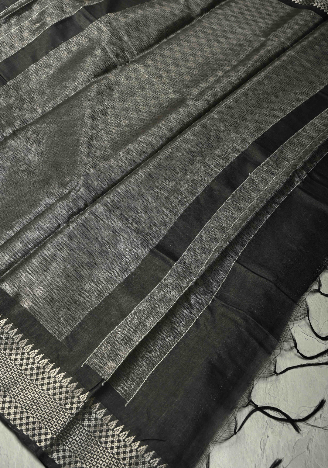 Black Semi Tussar Tissue Saree with Temple Silver Zari Border