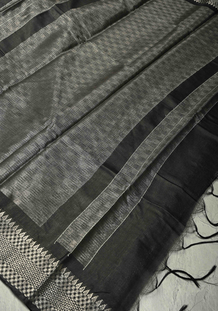 Black Semi Tussar Tissue Saree with Temple Silver Zari Border