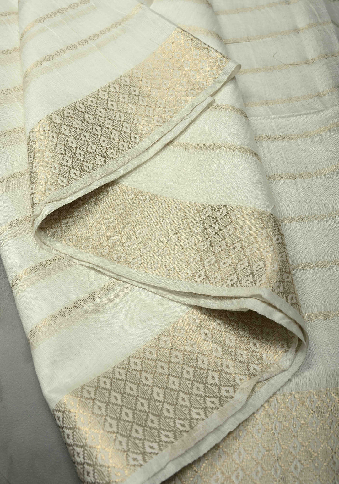 White Semi Tussar Saree with Zari Stripes and Zari Border