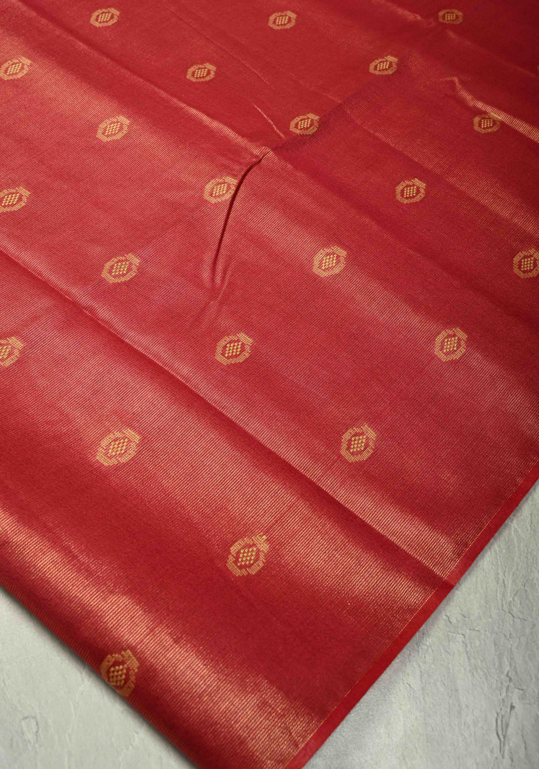 Brick Red Borderless Semi Tussar Tissue Saree with Resham Buttas