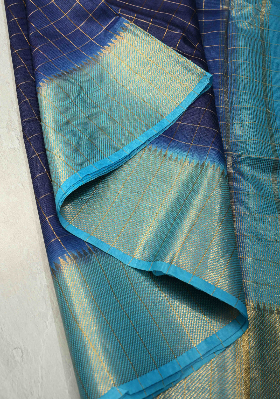 Navy Blue Semi Tussar Tissue Saree with Zari Checks and Contrast Zari Border