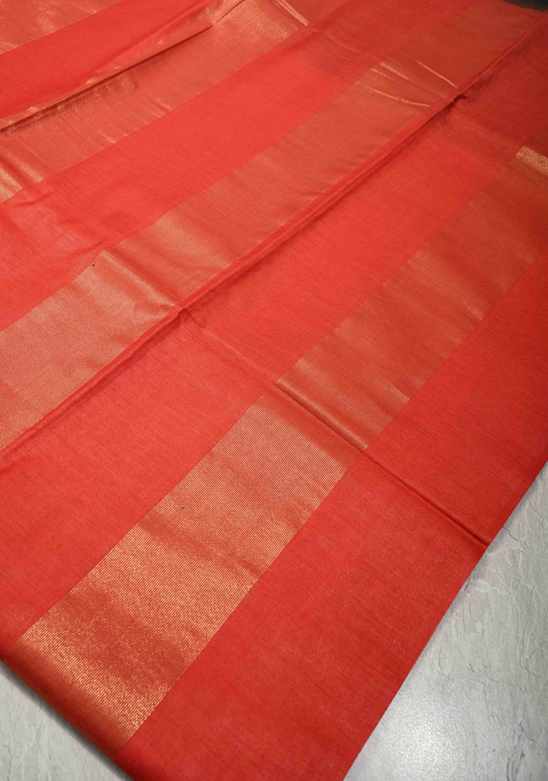 Vermilion Red Borderless Semi Tussar Saree with Muted Tissue Panel and Contrast Sequins Pallu