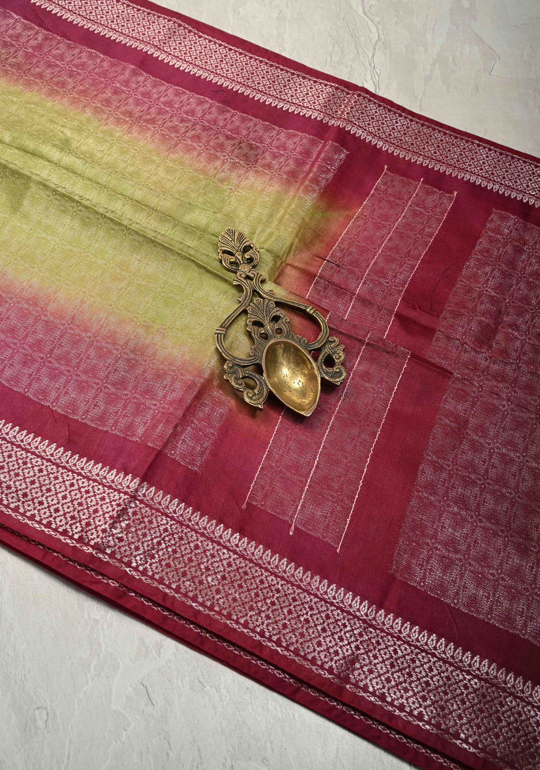 Olive Green Semi Tussar Tissue Saree with Contrast Silver Zari Border