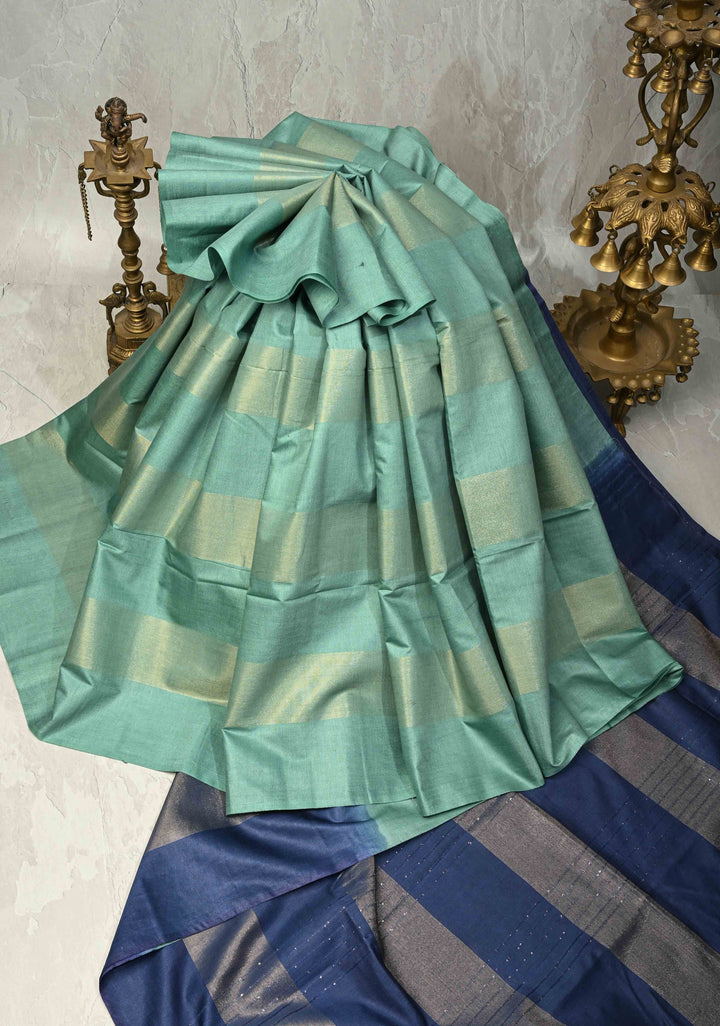 Sage Green Borderless Semi Tussar Saree with Muted Tissue Panel and Contrast Sequins Pallu