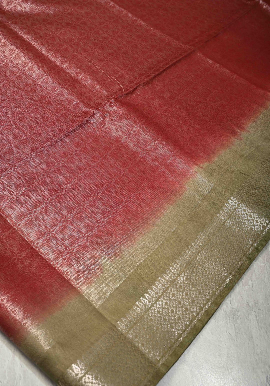 Brick Red Semi Tussar Tissue Saree with Zari Border