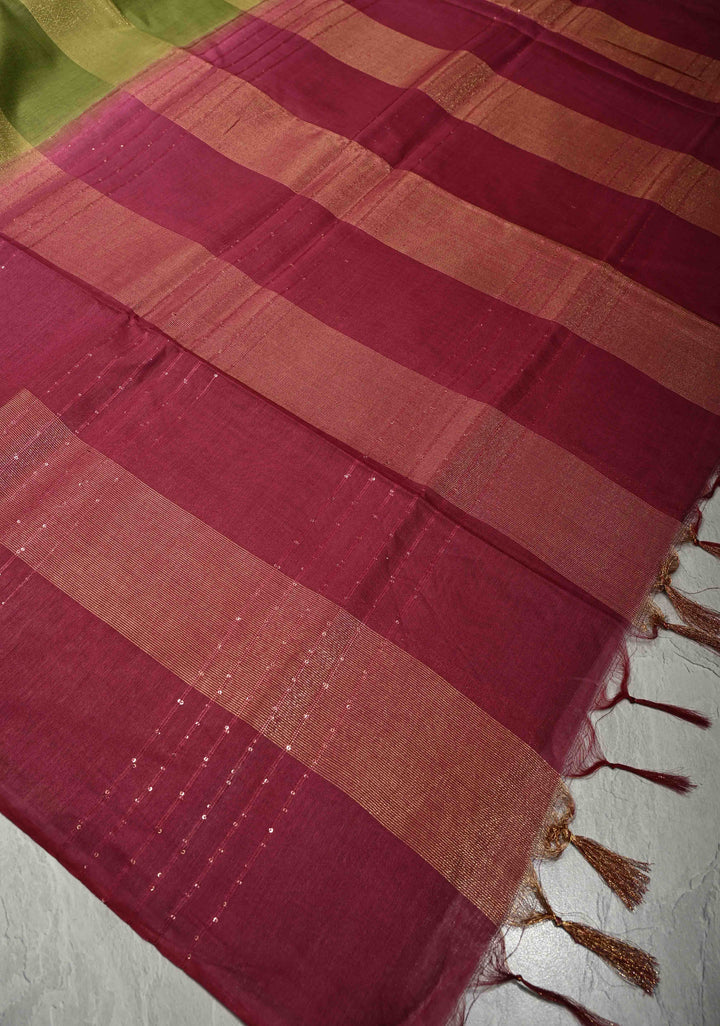 Sap Green Borderless Semi Tussar Saree with Muted Tissue Panel and Contrast Sequins Pallu