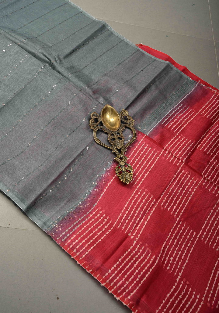 Cloudy Gray Borderless Semi Tussar Saree with Pocket Sequins Detailing and Contrast Pallu | SHOBITAM