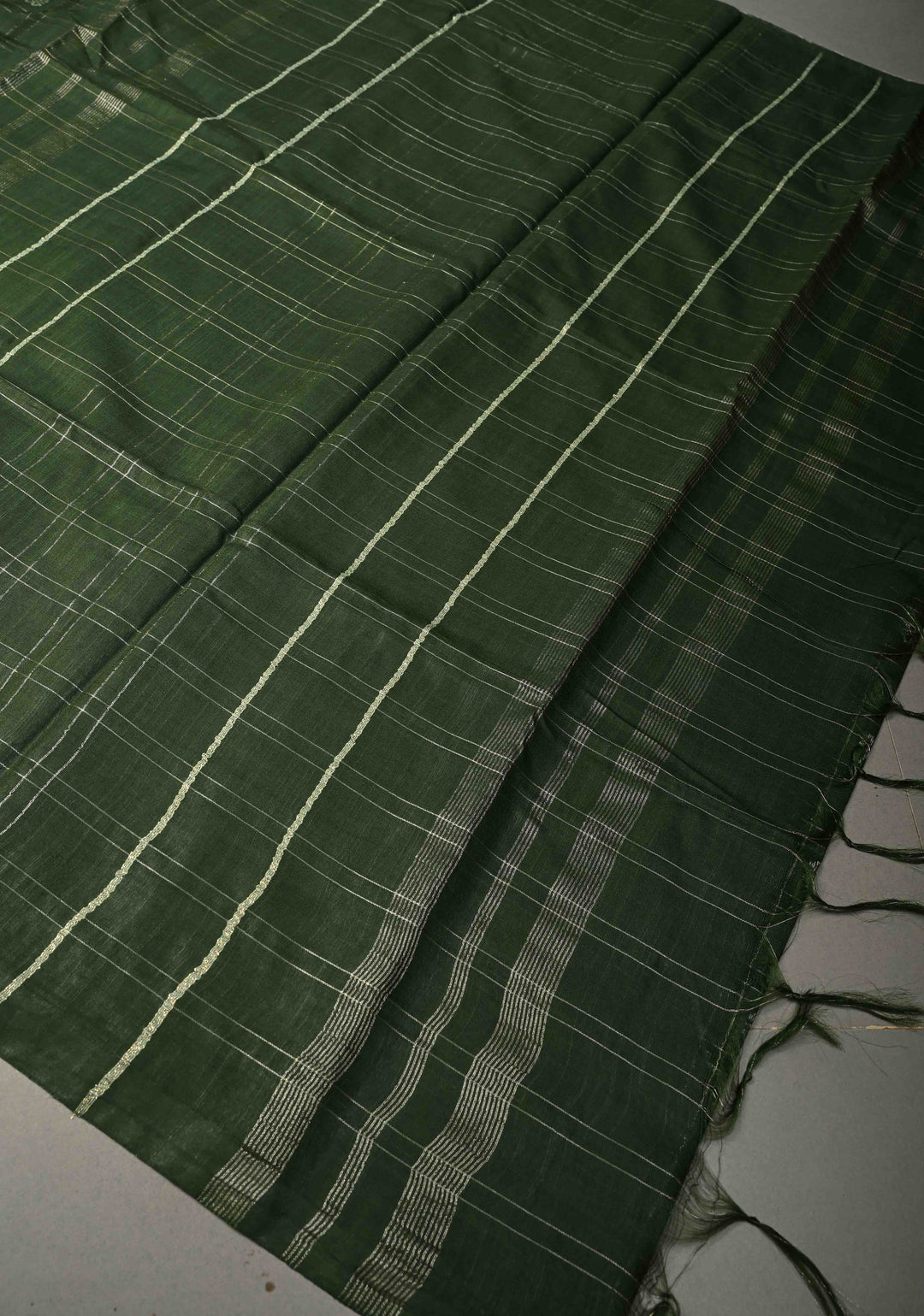 Forest Green Borderless Semi Tussar Saree with Zari Checks and Zari Buttas | SHOBITAM