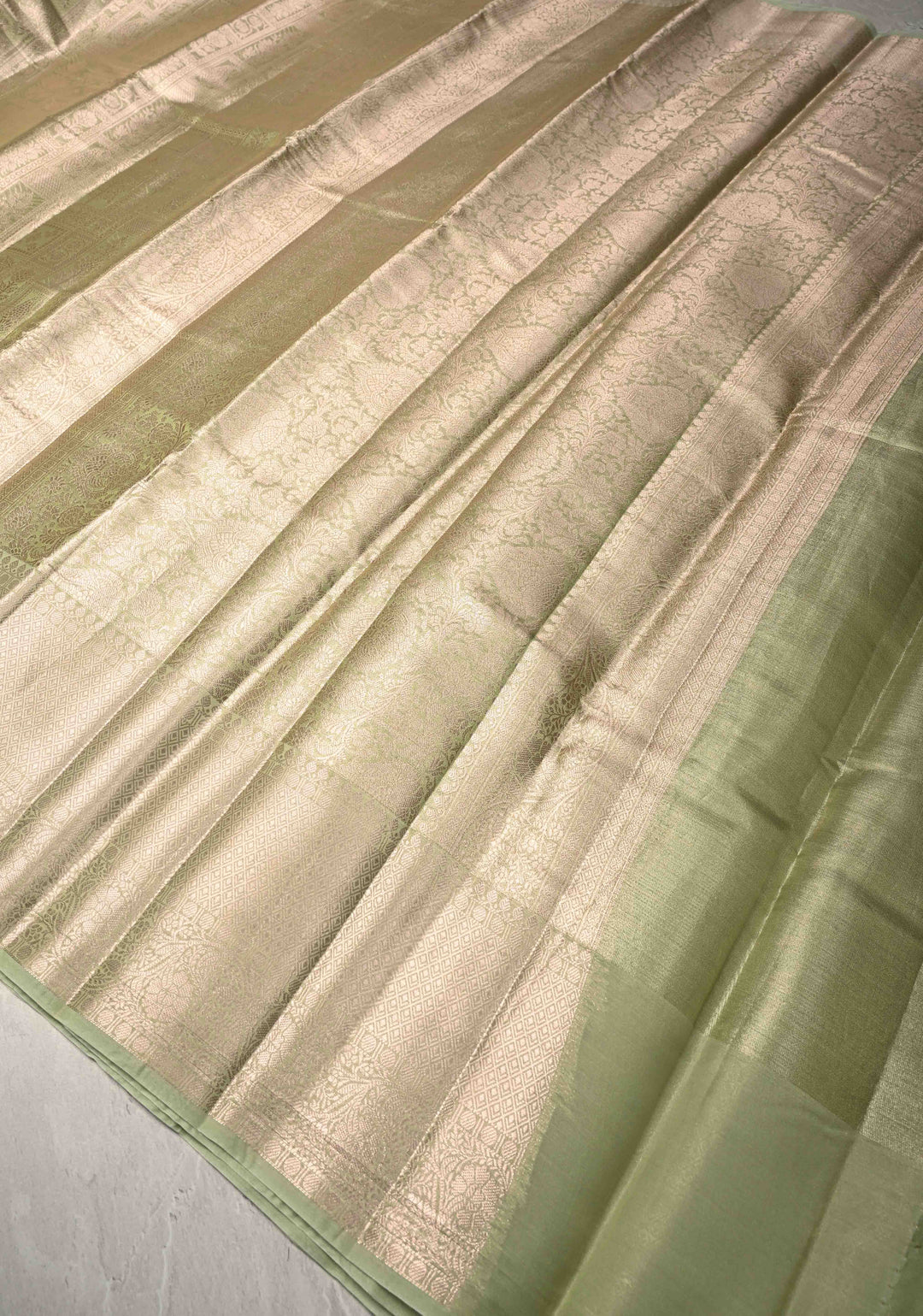 Pale Lime Green Kanjivaram Tissue Semi Silk Saree with Floral Brocade and Zari Border