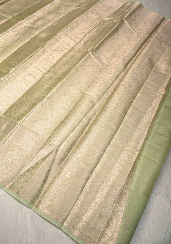Pista Green Kanjivaram Tissue Semi Silk Saree with Brocade Jaal and Zari Border