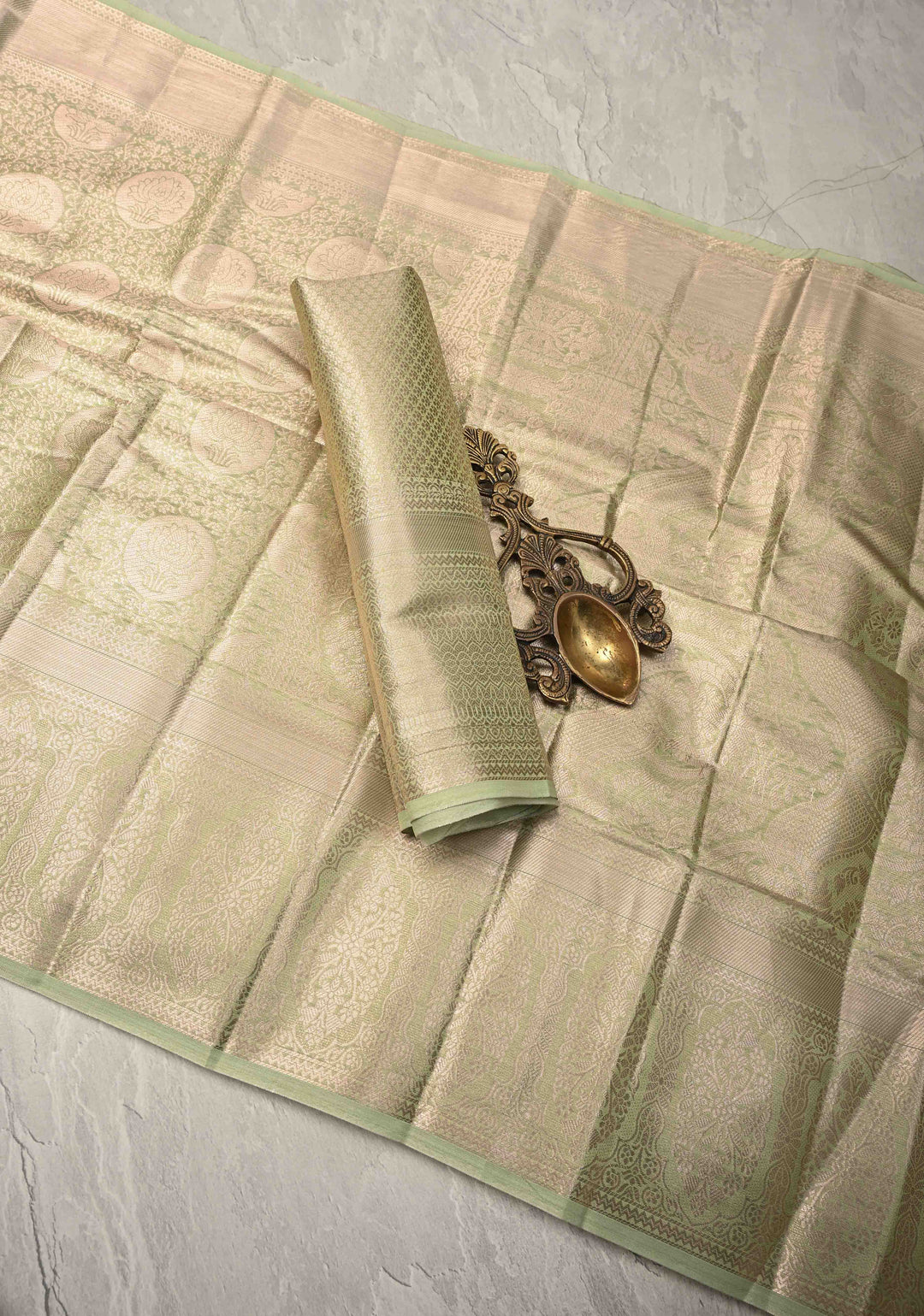 Pista Green Kanjivaram Tissue Semi Silk Saree with Brocade Jaal and Zari Border