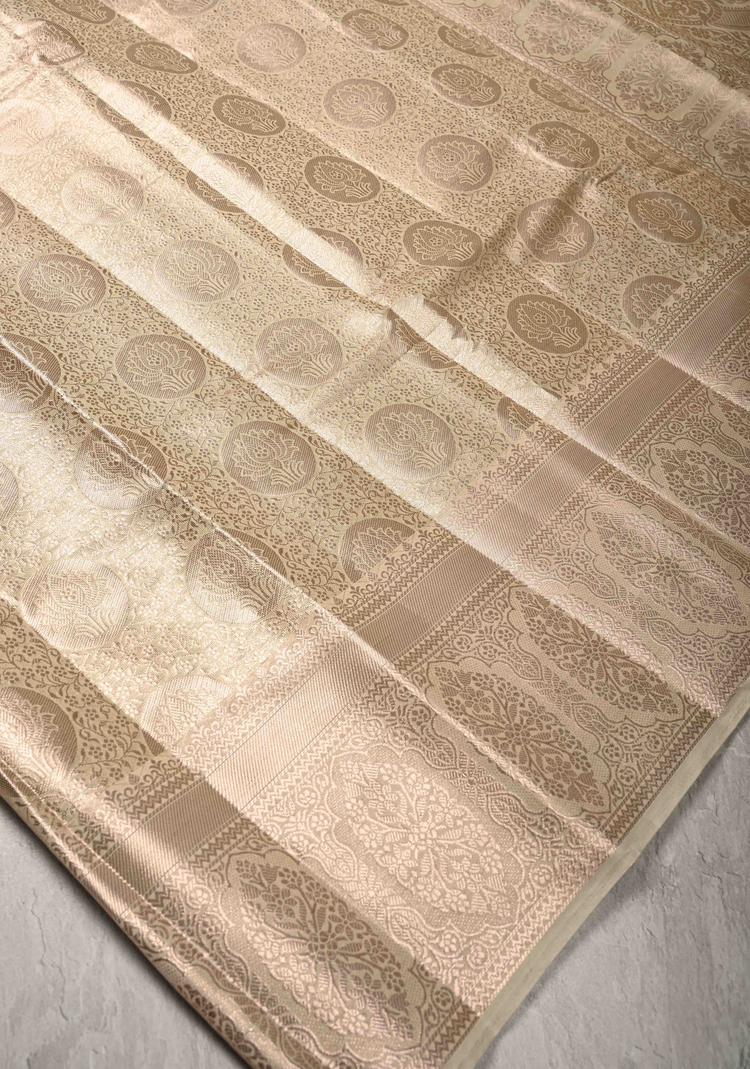 Beige Kanjivaram Tissue Semi Silk Saree with Floral Brocade and Zari Border