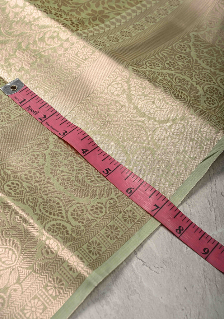 Pale Lime Green Kanjivaram Tissue Semi Silk Saree with Floral Brocade and Zari Border