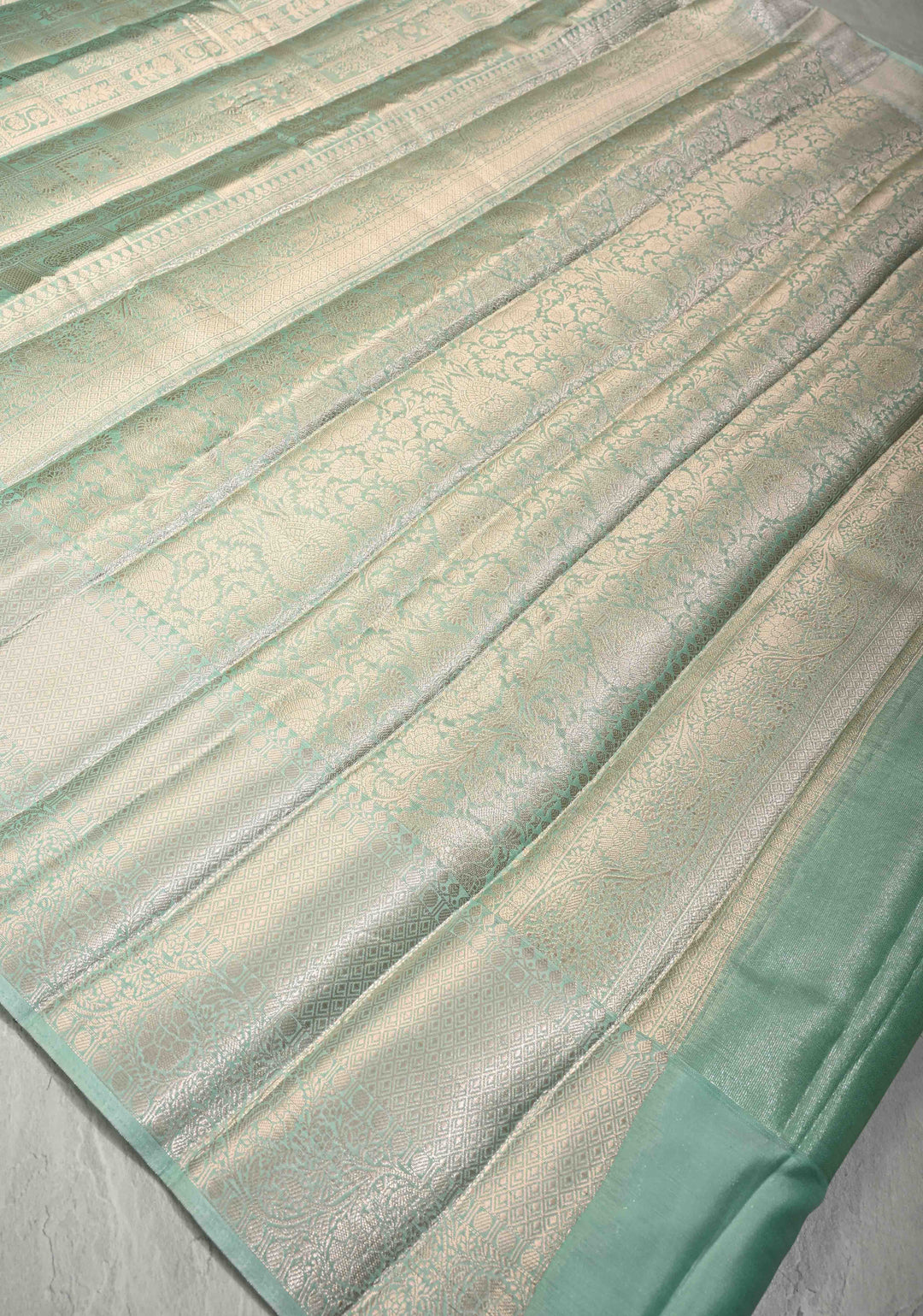 Mint green Kanjivaram Tissue Semi Silk Saree with Patola Brocade and Zari Border