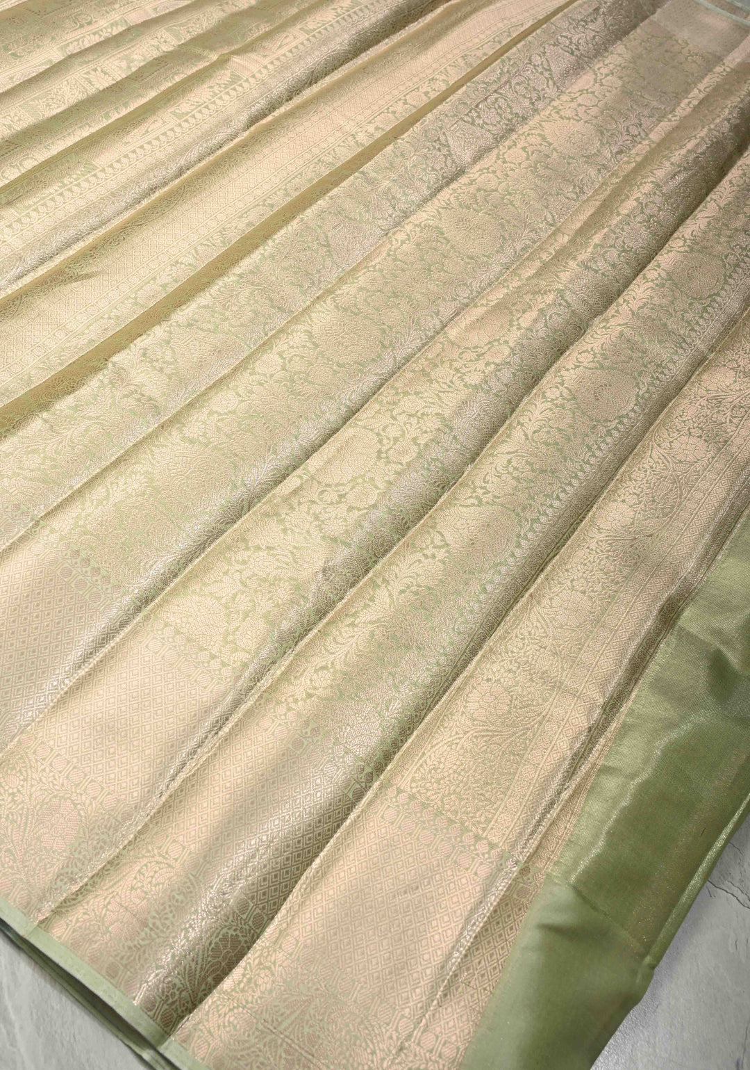 Light lime Green Kanjivaram Tissue Semi Silk Saree with Zari Patola Brocade and Zari Border