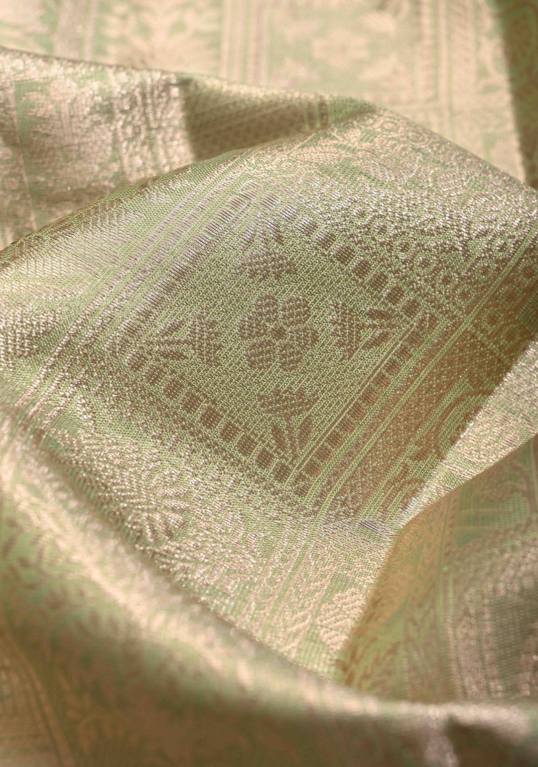 Light lime Green Kanjivaram Tissue Semi Silk Saree with Zari Patola Brocade and Zari Border