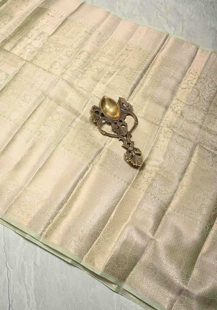 Light lime Green Kanjivaram Tissue Semi Silk Saree with Zari Patola Brocade and Zari Border