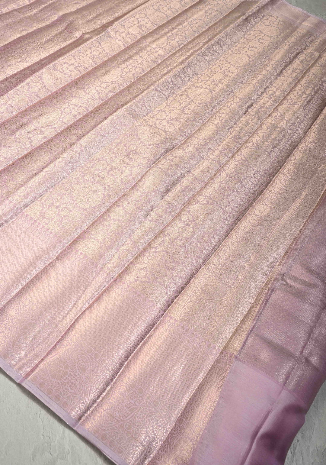 Radiant Lavender-Pink Tissue Silk Saree with Traditional Geometric and Floral Patola Brocade and Wide Border