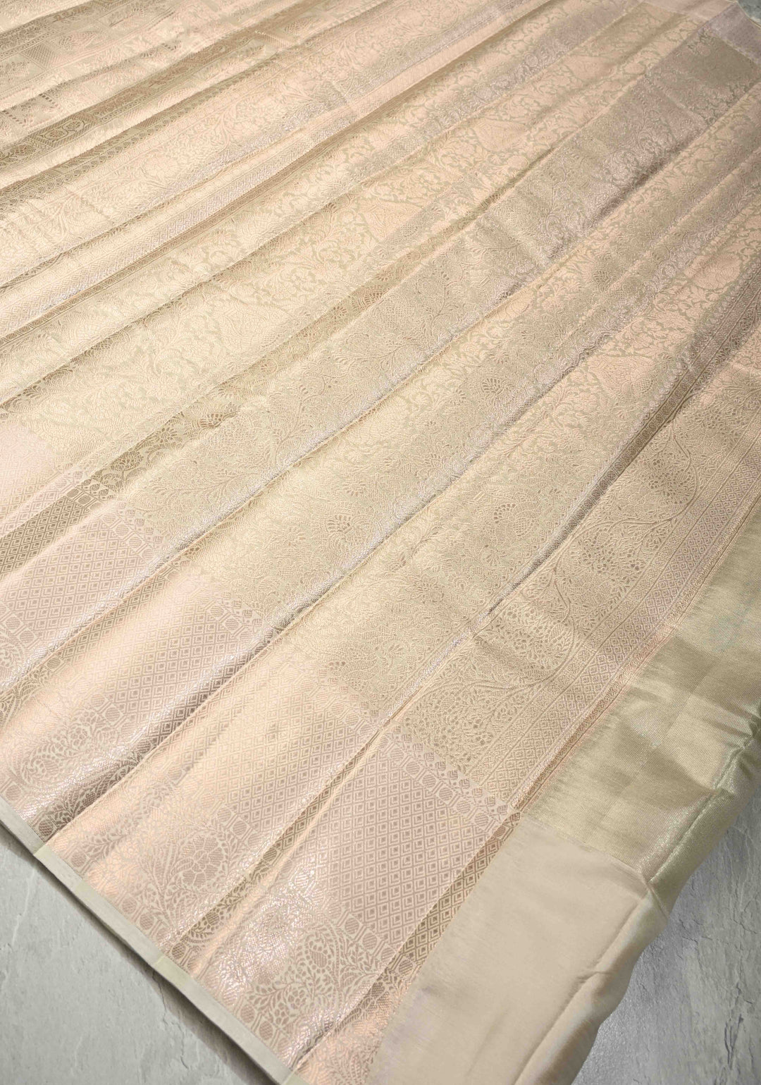Beige Tissue Kanjivaram Semi Silk Patola Brocade Saree with wide zari Border