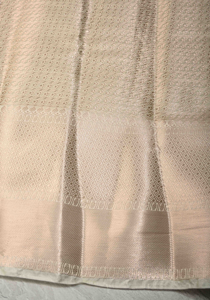 Beige Tissue Kanjivaram Semi Silk Patola Brocade Saree with wide zari Border