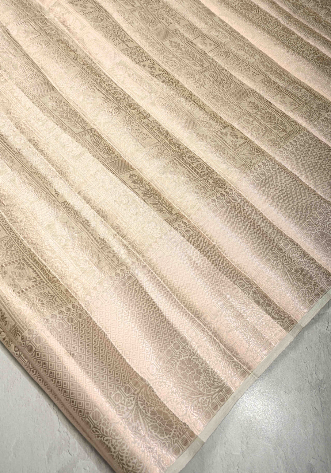 Beige Tissue Kanjivaram Semi Silk Patola Brocade Saree with wide zari Border