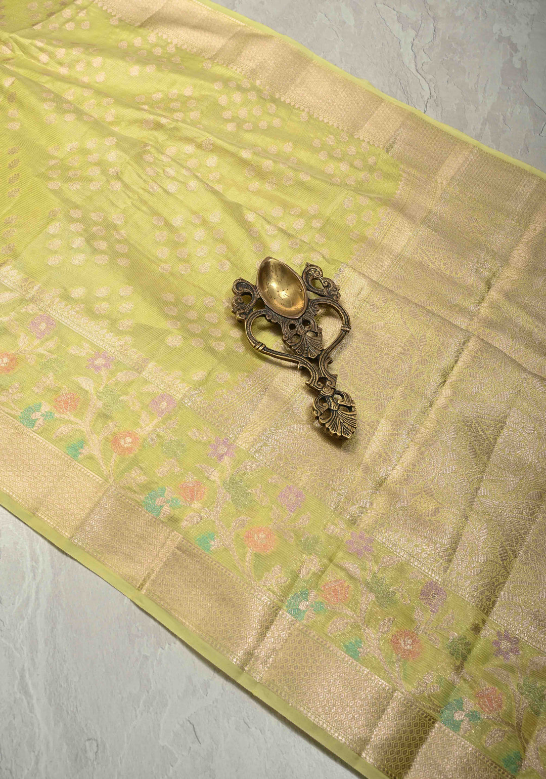 Lime Green Tissue Kanjivaram Semi Silk Saree with Leaf Buttas and Pastel meenakari Vine border