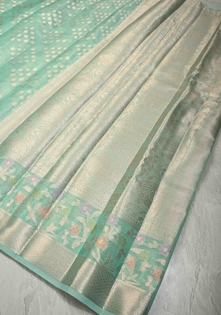Mint Green Tissue Kanjivaram Semi Silk Saree with Leaf Buttas and Pastel meenakari Vine border