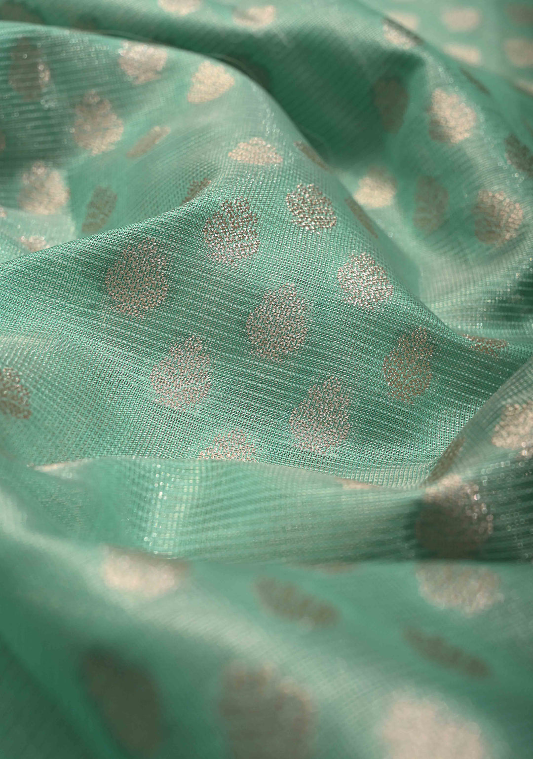 Mint Green Tissue Kanjivaram Semi Silk Saree with Leaf Buttas and Pastel meenakari Vine border