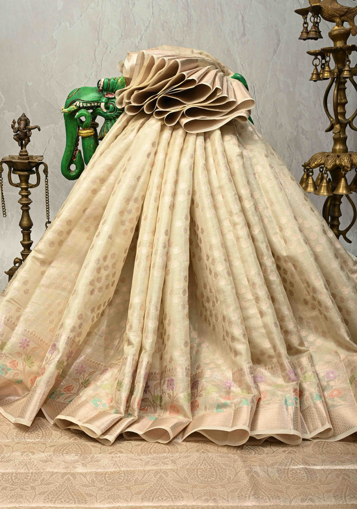 Ivory Tissue Kanjivaram Semi Silk Saree with  Leaf Buttas and Pastel meenakari Vine border