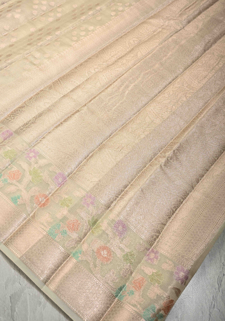 Ivory Tissue Kanjivaram Semi Silk Saree with  Leaf Buttas and Pastel meenakari Vine border