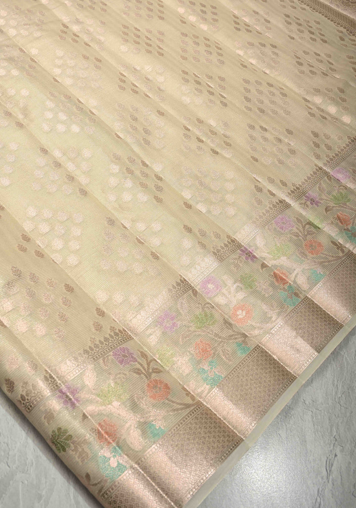 Ivory Tissue Kanjivaram Semi Silk Saree with  Leaf Buttas and Pastel meenakari Vine border