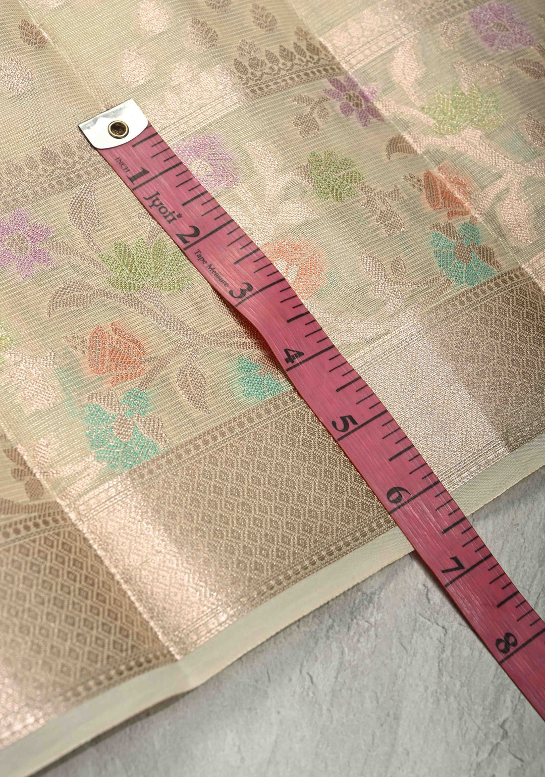 Ivory Tissue Kanjivaram Semi Silk Saree with  Leaf Buttas and Pastel meenakari Vine border