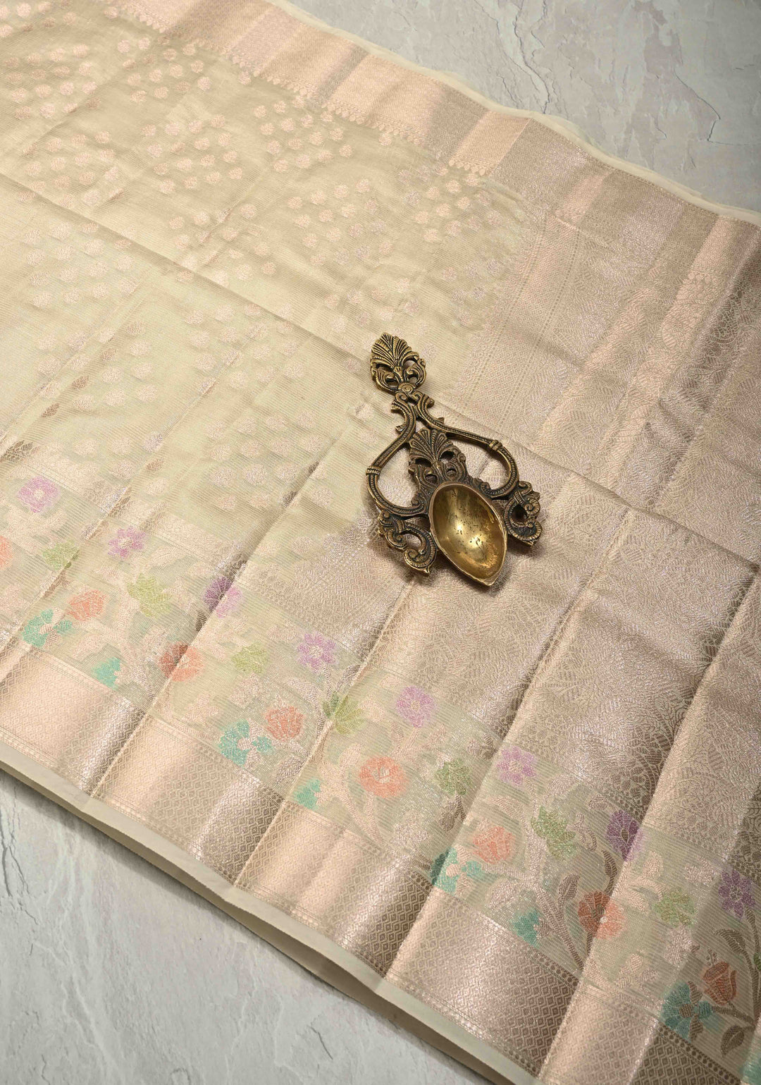 Ivory Tissue Kanjivaram Semi Silk Saree with  Leaf Buttas and Pastel meenakari Vine border