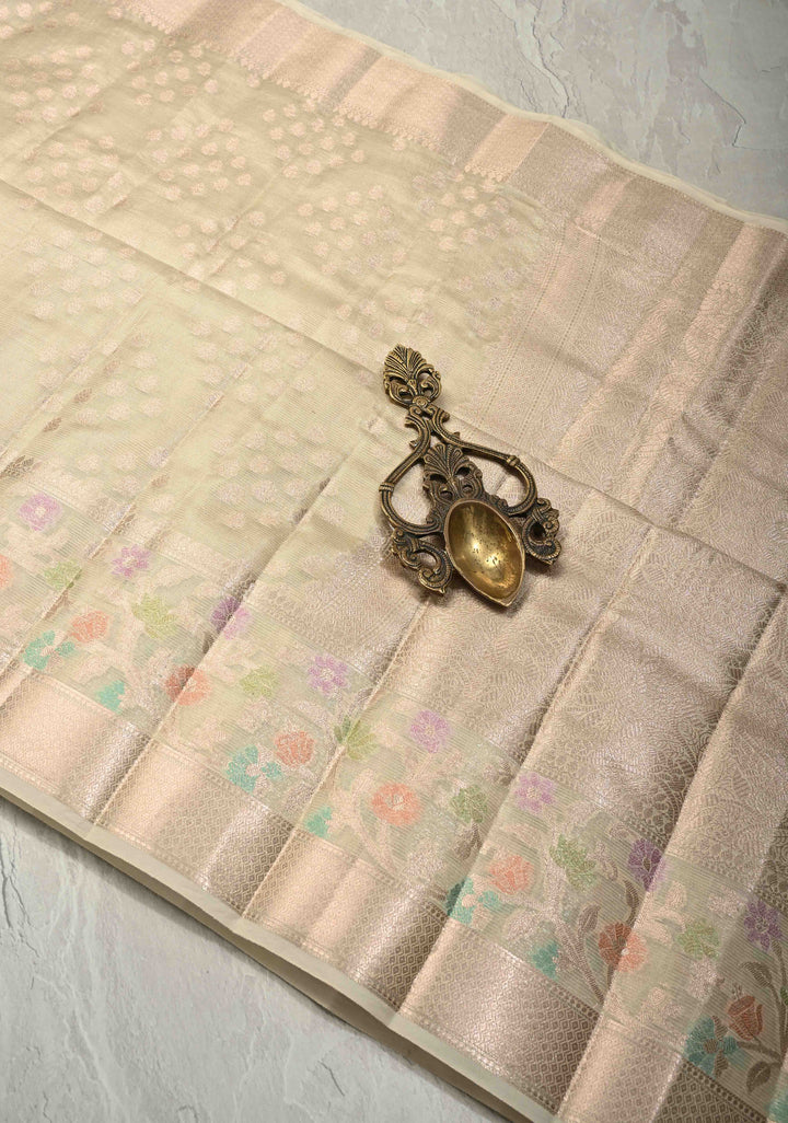Ivory Tissue Kanjivaram Semi Silk Saree with  Leaf Buttas and Pastel meenakari Vine border
