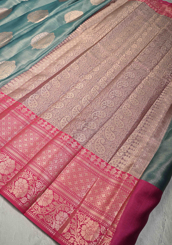 Teal Blue Tissue Kanjivaram Semi Silk Saree with Large Floral Zari Buttas and Pink Floral Wide Border