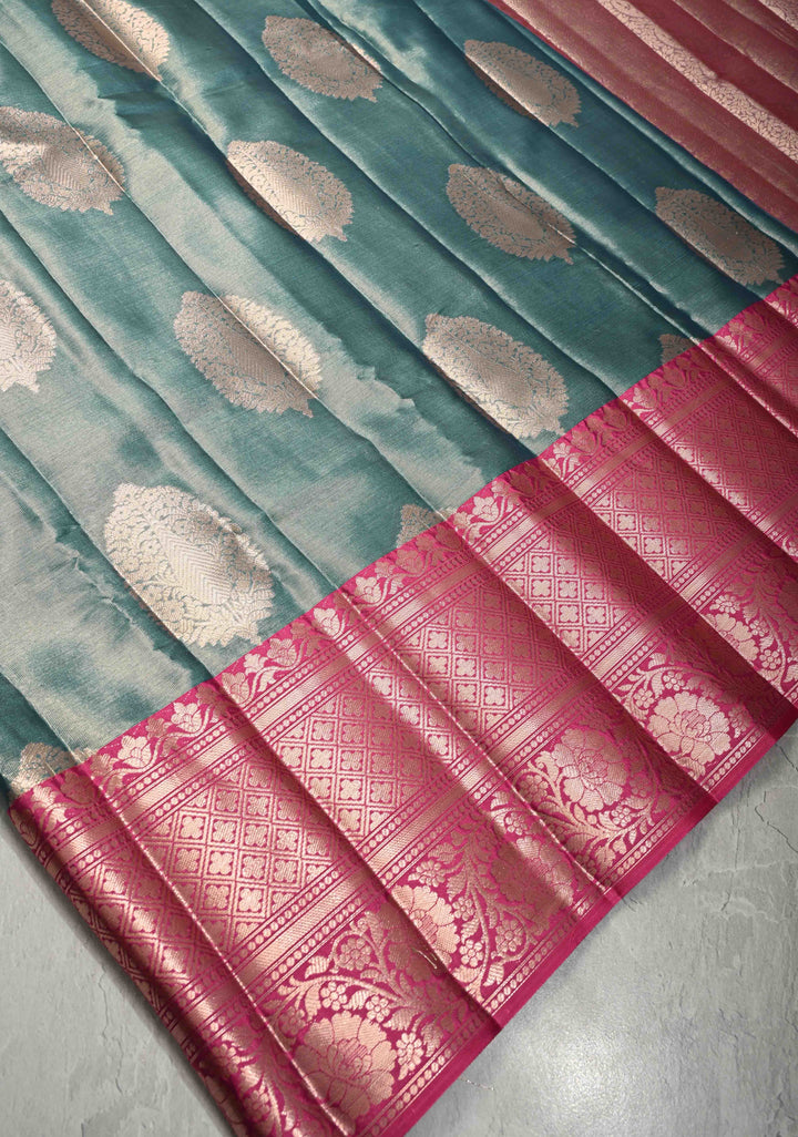 Teal Blue Tissue Kanjivaram Semi Silk Saree with Large Floral Zari Buttas and Pink Floral Wide Border