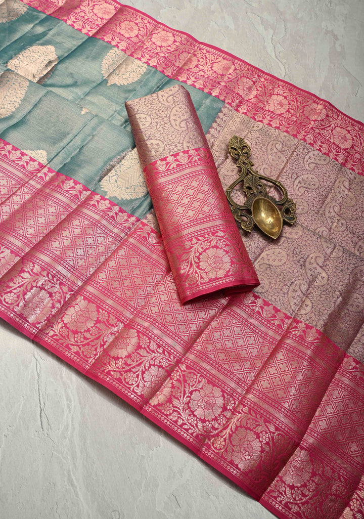 Teal Blue Tissue Kanjivaram Semi Silk Saree with Large Floral Zari Buttas and Pink Floral Wide Border