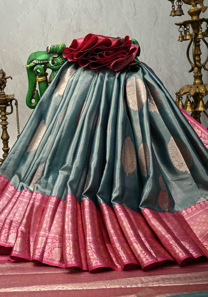 Teal Blue Tissue Kanjivaram Semi Silk Saree with Large Floral Zari Buttas and Pink Floral Wide Border