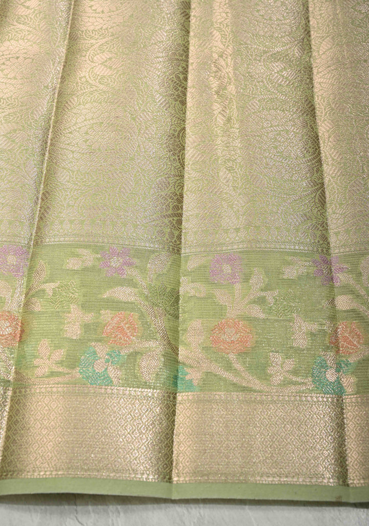 Light olive Green Tissue Kanjivaram Semi Silk Saree with Leaf Buttas and Pastel meenakari Vine border