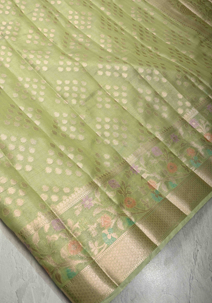 Light olive Green Tissue Kanjivaram Semi Silk Saree with Leaf Buttas and Pastel meenakari Vine border