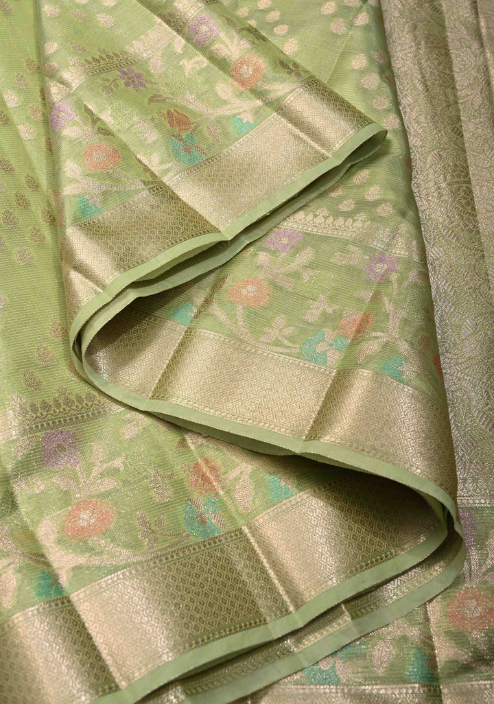 Light olive Green Tissue Kanjivaram Semi Silk Saree with Leaf Buttas and Pastel meenakari Vine border