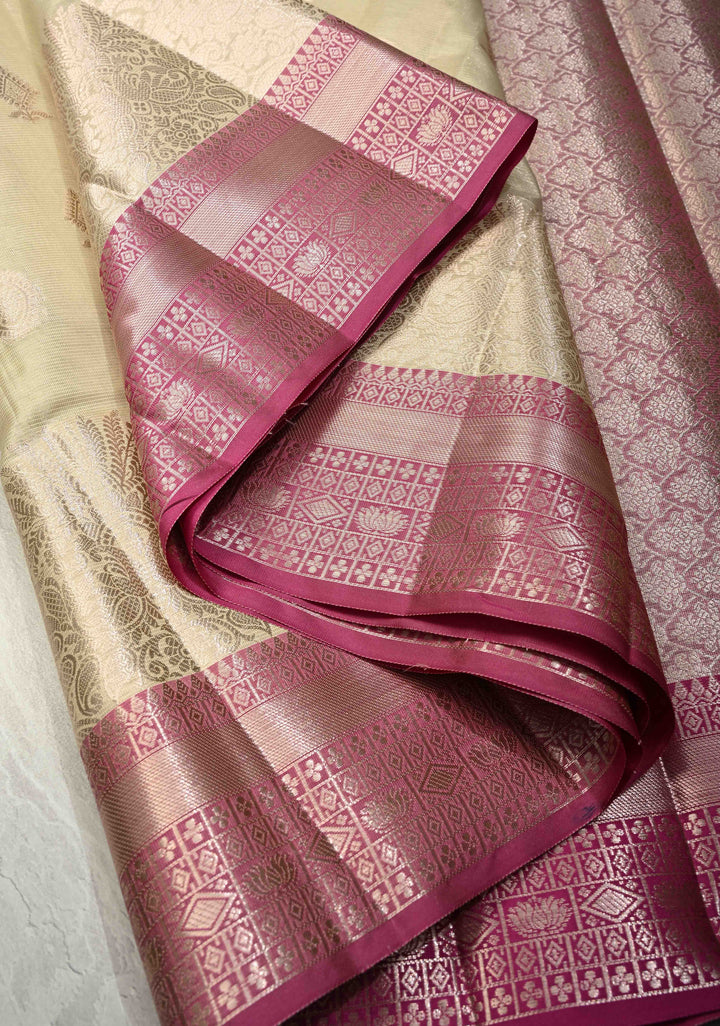 Creamy Green Kanjivaram Tissue Semi Silk Saree with Zari Buttas and Contrast Zari Border
