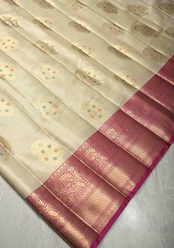 Off White Kanjivaram Tissue Semi Silk Saree with Meenakari Paisley Zari Buttas and Contrast Zari Border