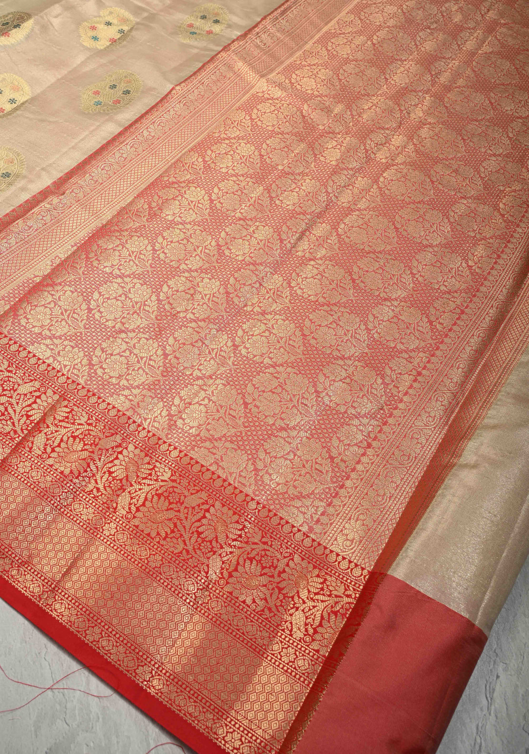 Beige Kanjivaram Tissue Semi Silk Saree with Meenakari Paisley Buttas and Contrast Zari Border