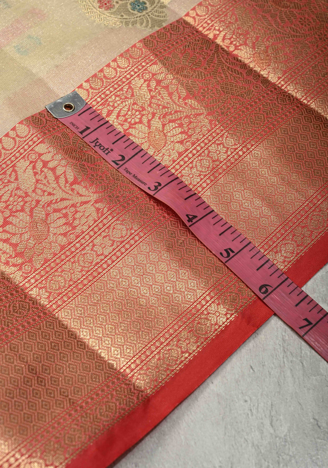 Beige Kanjivaram Tissue Semi Silk Saree with Meenakari Paisley Buttas and Contrast Zari Border