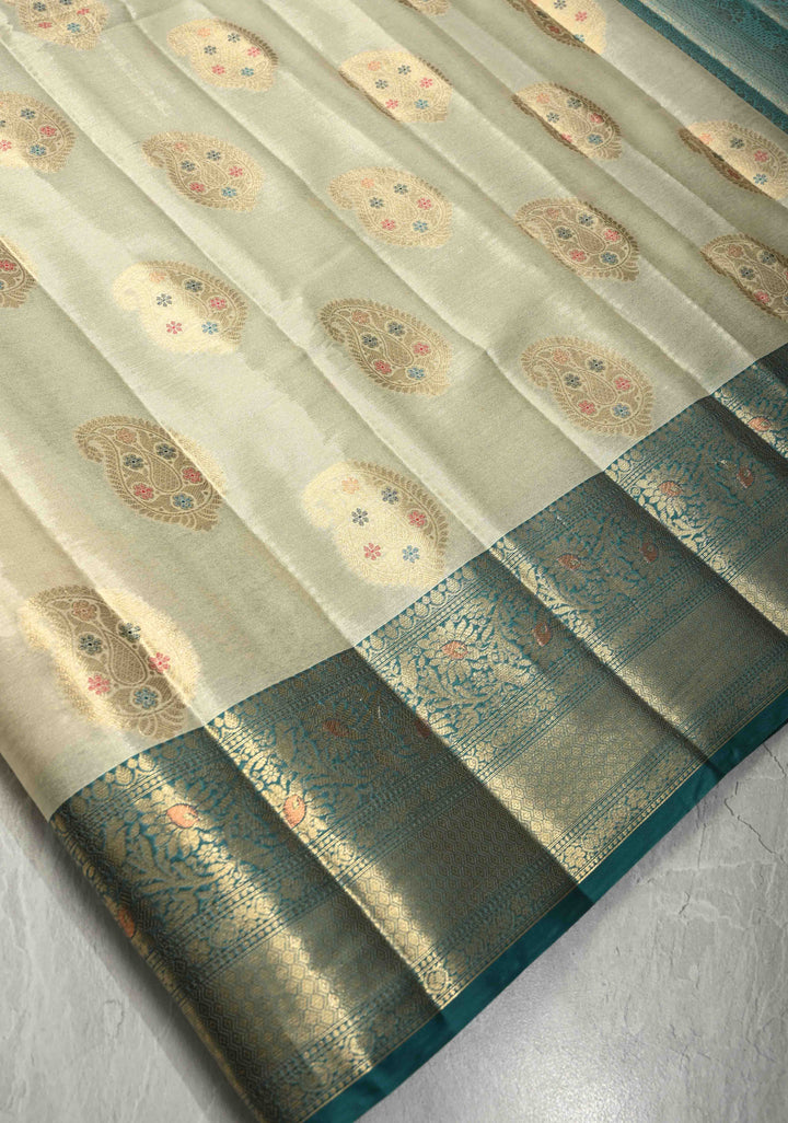 Beige Kanjivaram Tissue Semi Silk Saree with Meenakari Paisley Zari Buttas and Contrast Zari Border